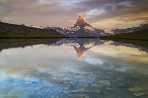 Images Dated 22nd November 2016: The Matterhorn, Zermatt, Switzerland. The first reflections at sunrise in the waters