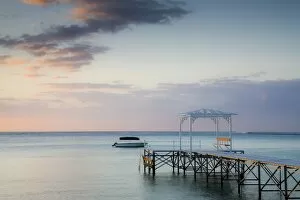 Images Dated 15th October 2008: Mauritius, Western Mauritius, Le Morne Peninsula, pier at the Dinarobin Hotel, dusk