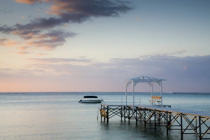 Images Dated 15th October 2008: Mauritius, Western Mauritius, Le Morne Peninsula, pier at the Dinarobin Hotel, dusk