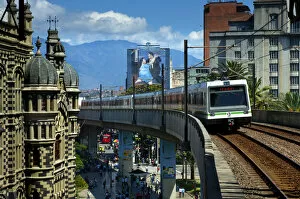 Images Dated 13th April 2012: Medellin, Colombia, Elevated Metro Pulls Into Parque Berrio Station In Front Of The
