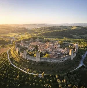 Wall Gallery: medieval town of Monteriggioni at sunset. Monteriggioni, Siena district, Tuscany, Italy
