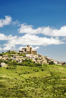 Medieval village of Ujue with the sanctuary-fortress of Santa Maria on the top, Navarre
