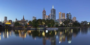 Business District Prints: Melbourne skyline along Yarra River at dusk, Melbourne, Victoria, Australia