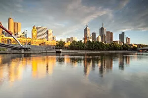 Images Dated 24th June 2014: Melbourne, Victoria, Australia. Yarra river and city at sunrise, with Flinders station
