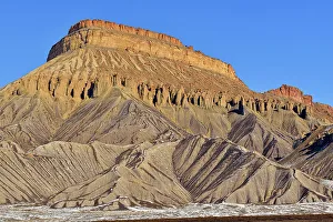 Pinnacles Prints: Melting snow on eroded butte, near Grand Junction, Colorado, USA
