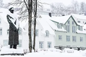 Residential Building Prints: Memorial statue in the snowy city centre of Tromso, Norway