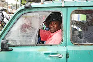 Two Men Prints: Two men in traffic in Puerto Tejada, Colombia, South America