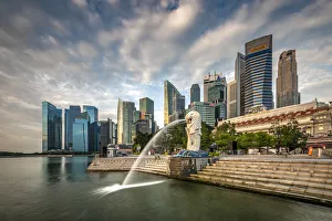 The Merlion statue with city skyline in the background, Marina Bay, Singapore