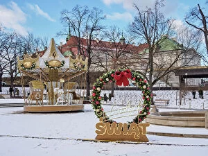 Images Dated 10th May 2023: Merry-go-round and Christmas Decorations at Mariensztat Market Square, Warsaw