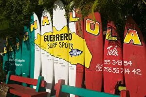 Mexico, Pacific Coast, Guerrero, Ixtapa, Catcha La Ola Surf Shop Sign