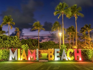 Miami Beach Sign at Ocean Drive Art Deco District, illuminated with iconic Neon Colors South Beach, Miami Beach, Florida, USA