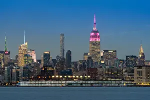 Skyscapers Prints: Midtown skyline at dusk with the Empire State Building in pink and white colors, Manhattan