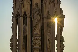 Touristic Attraction Prints: Milan, Lombardy, Italy Detail of a statue on one of the spiers of Milano Cathedral