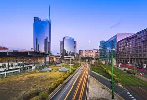 Milan, Lombardy, Italy. Traffics light trails in the financial district of Porta Nuova