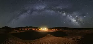 Deserted Gallery: Milky way over Camp Mars village in the sand dunes, Sahara desert, Tunisia, Northern
