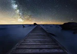 Nightscape Prints: Milky way over an old pier near Livorno in Tuscany, Italy