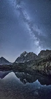Milky Way Prints: The milky way reflected in Lake Superior near Mount Monviso. Cozian Alps. Piedmont. Italy