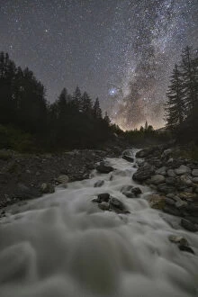 Milkyway and stars at Dora di Veny river during summer, Val Veny, La Visaille, Courmayeur