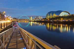 Tyne And Wear Prints: Millenium Bridge illuminated at dusk, River Tyne, Newcastle, Tyne and Wear, England