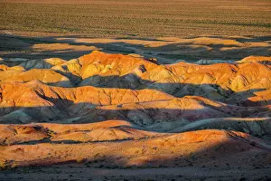 Minerals Prints: Mineral streaked white sand-hills of Tsagaan Suvarga (White Stupa) at sunset, Mongolia