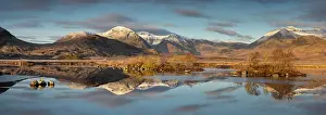March Prints: Mirror reflections on Lochan Na h-achlaise on a frosty morning on Rannoch Moor in the Scottish Highlands
