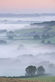 September Prints: Mist covered countryside at dawn, Stockleigh Pomeroy, Devon, England. Autumn (September)