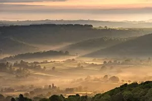 Images Dated 17th May 2016: Mist covered rolling countryside at dawn, Dartmoor National Park, Devon, England