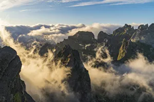 Mist on the peaks from Vereda do Areeiro. Pico do Arieiro, Funchal, Madeira Island