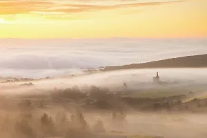 Minions Prints: Mist shrouded landscape with tin mine ruins at dawn