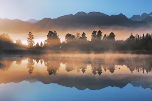 Misty mood at Lake Matheson - New Zealand, South Island, West Coast, Westland