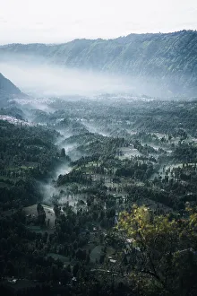 Images Dated 28th February 2023: Misty morning by the Mount Bromo, landscape and town by the Volcano