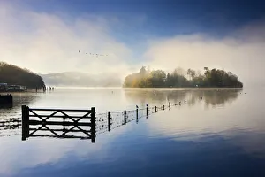 Misty morning on the shores of Derwent Water, Lake District National Park, Cumbria Misty morning on the shores of Derwent Water, Lake District National Park, Cumbria