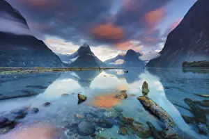 Range Prints: Mitre Peak reflecting in the fjord water at sunrise at Milford Sound in New Zealand