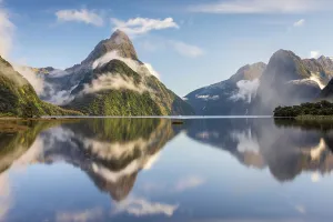 South Island Prints: Mitre Peak reflecting in a mirrorlike Milford Sound