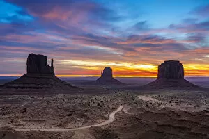 Images Dated 7th January 2020: The Mittens against cloudy sky at sunrise, Monument Valley, Arizona, USA