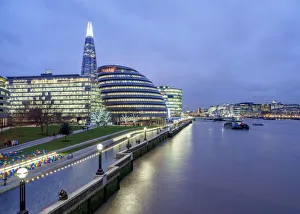 Modern Architecture by the Queens Walk and The Shard at twilight, London, England
