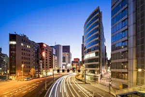 Business District Prints: Modern office buildings along a street in Shinjuku, Tokyo, Japan