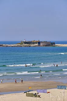 Images Dated 9th January 2023: Moledo do Minho beach. In the background the Insua fortress, dating back to the 17th century