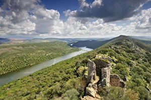 Monfrague National Parks panorama with a ruined castle over the Tagus river. Spain