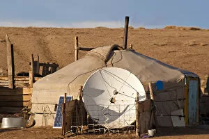 Images Dated 27th June 2011: Mongolia, Bayangobi, A nomads traditional Ger with satellite dish and solar panel