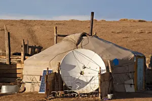 Yurt Prints: Mongolia, Bayangobi, A nomads traditional Ger with satellite dish and solar panel