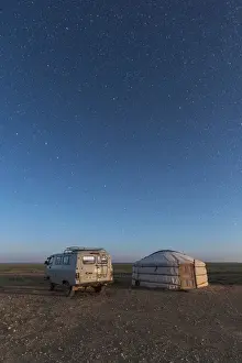 Middle Gobi Prints: Mongolian traditional ger and soviet minivan under a starry sky
