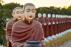 Myanmar Gallery: Monk statues at Myo Yar Pyae Pagoda at sunset, Monywa, Monywa Township, Monywa District
