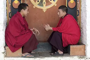 Monks at the Simtokha Dzong in Bhutan. Built in 1629 by Zhabdrung Ngawang Namgyal
