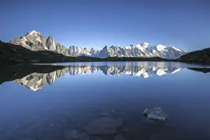 The Mont Blanc mountain range reflected in the waters of Lac de Chesery
