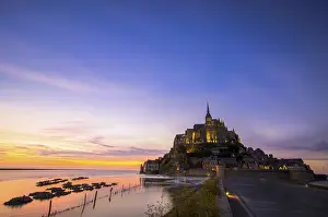 Mont St Michel, Normandy, France Mont St Michel photographed at sunset at high tide