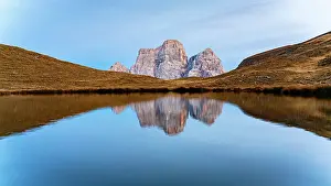 Environment Prints: Monte Pelmo rock peak reflecting in the pristine water of Lago delle Baste lake at sunset in autumn