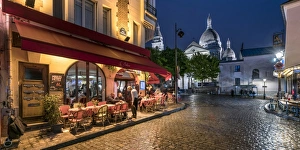 Images Dated 19th May 2017: Montmartre at night with illuminated Sacre Coeur Basilica in the background, Paris