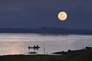 Amazon River Collection: Full Moon over the Amazon River, near Puerto Narino, Colombia