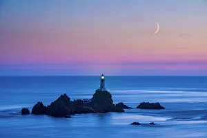 Moody Collection: Moon over Corbiere Lighthouse, Jersey, Channel Islands